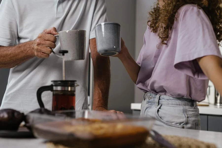 Couple sipping morning tea together