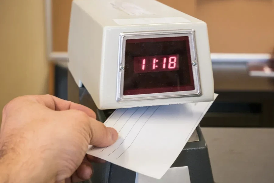 Electronic time recorder machine in an office