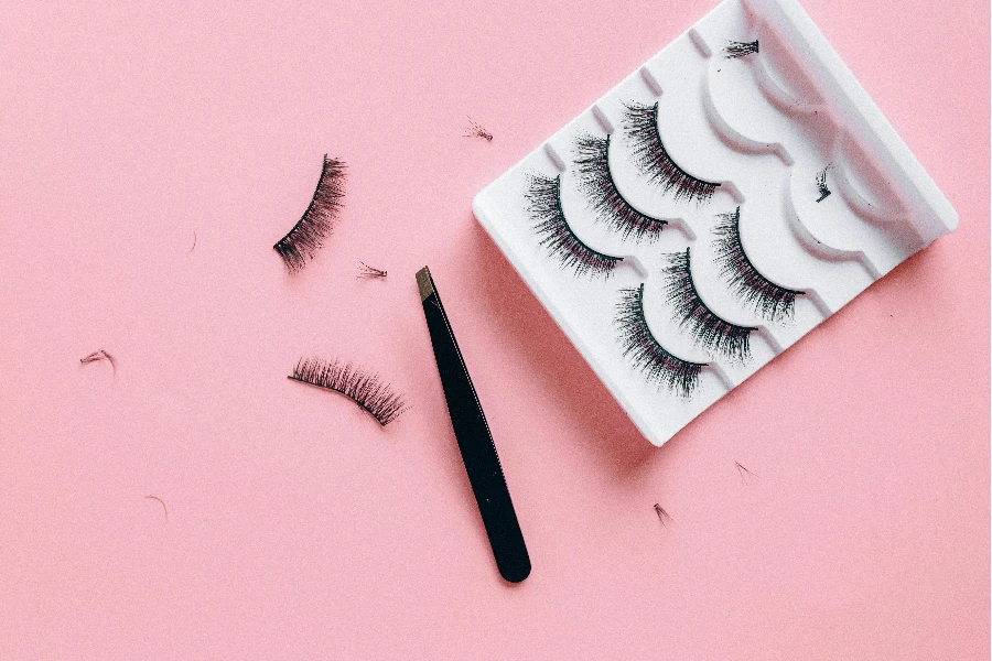 False Eyelashes on Pink Surface