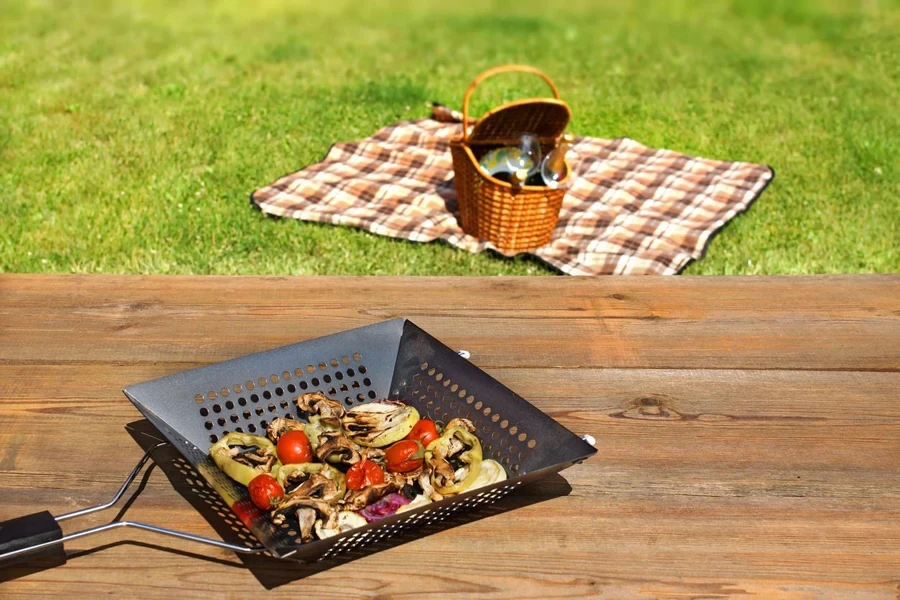 Grill Pan with grilled vegetables on the wood table.