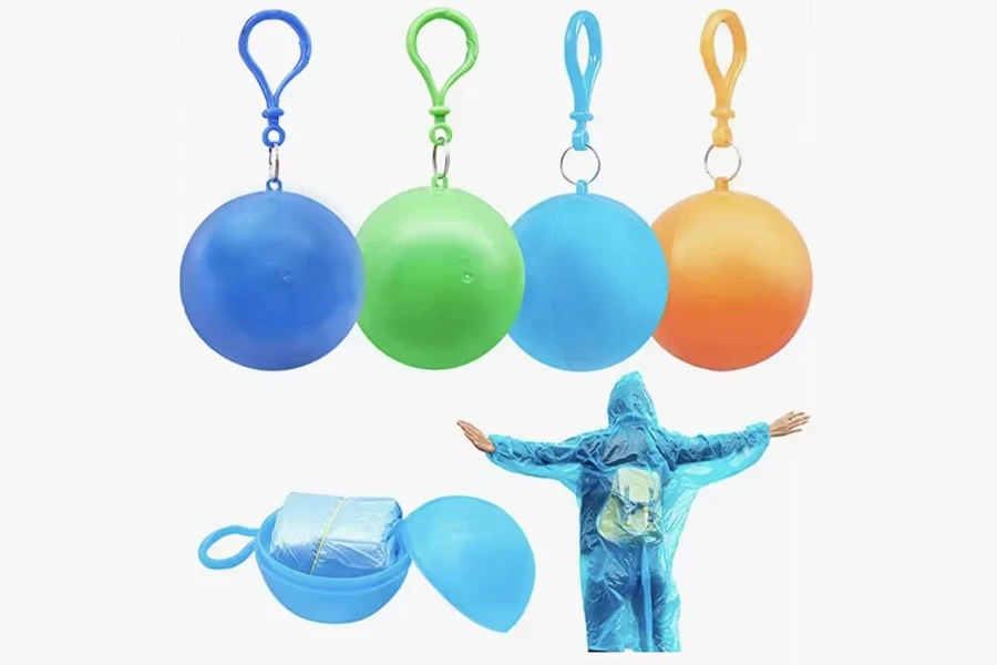 H496 Creative Outdoor Camping Keychain Portable Spherical Case Raincoat Plastic Ball Key Chain Disposable Rain Poncho