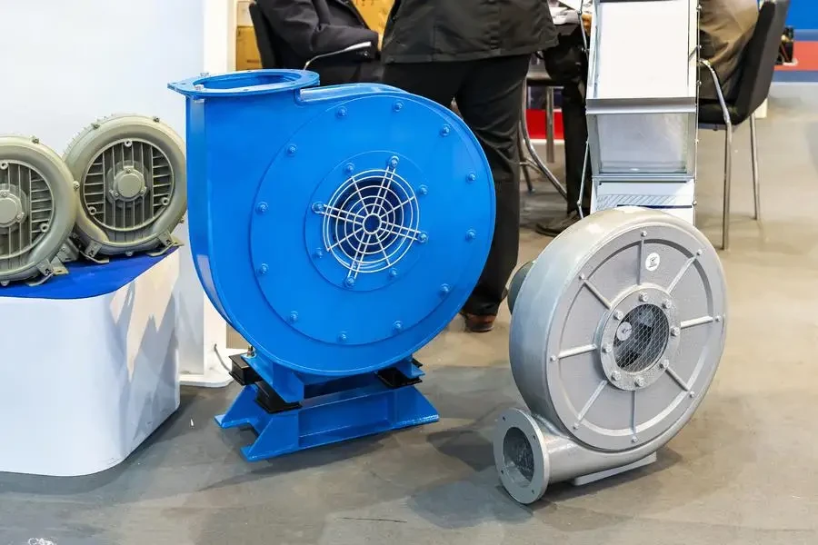 Industrial centrifugal fan electric air blower or high pressure vortex blower on ground stock photo