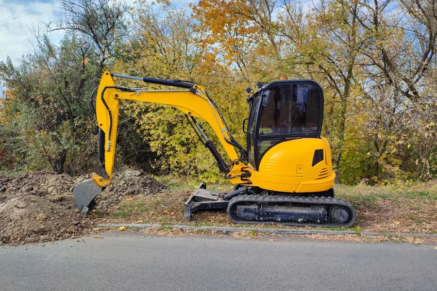 JCB digger or excavator performs excavation work outdoors