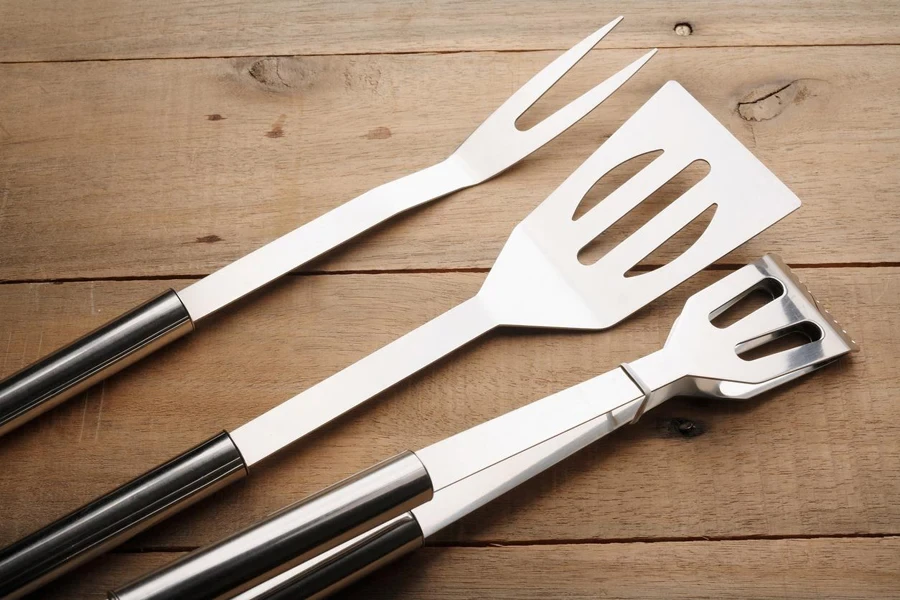 Kitchen Utensils on Wooden Background