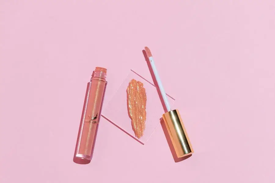 MISS SWISS Tish Lip Gloss Swatch and product photo by Ashley Piszek