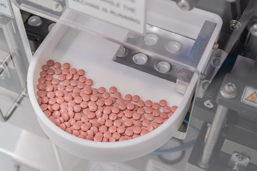 Macro-Shot-of-colour-Pills-and-Capsules-During-Production-and-Packing-Process-on-Modern-Pharmaceutical-Factory-1