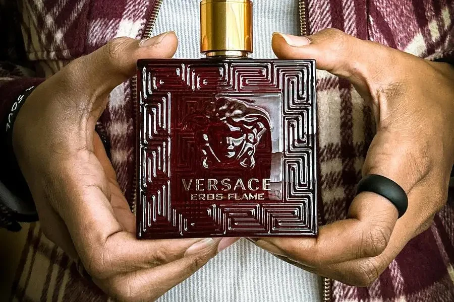 Man Hands Holding Versace Perfume by Terrance Barksdale