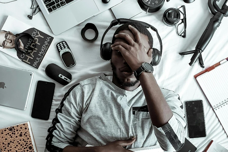 Man Wearing Black Headset by Ola Dapo