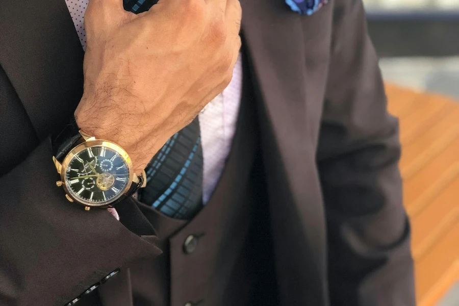 Man in Formal Suit Jacket Holding His Necktie