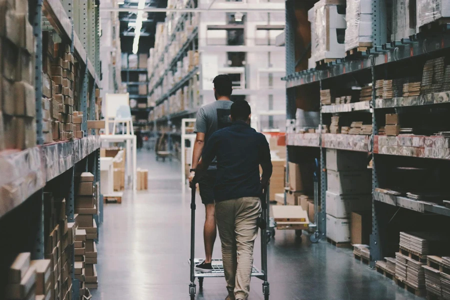 Men Going Around a Warehouse 