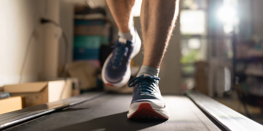 Men running on a treadmill at home