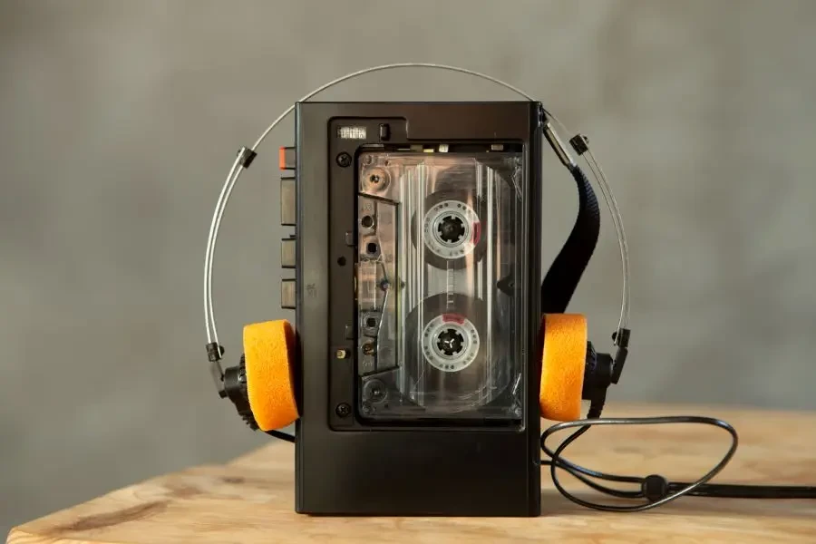Music listening concept. Vintage cassette tape, audio player and headphones