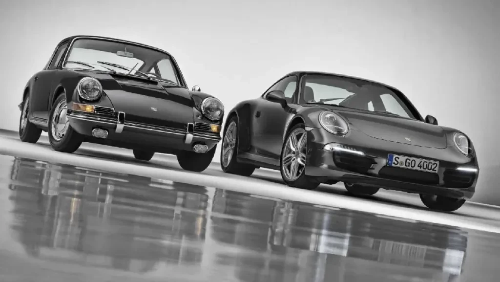 Original 1964 Porsche 911 and the Type 991 2013 Porsche 911 Carrera 4S Front Low