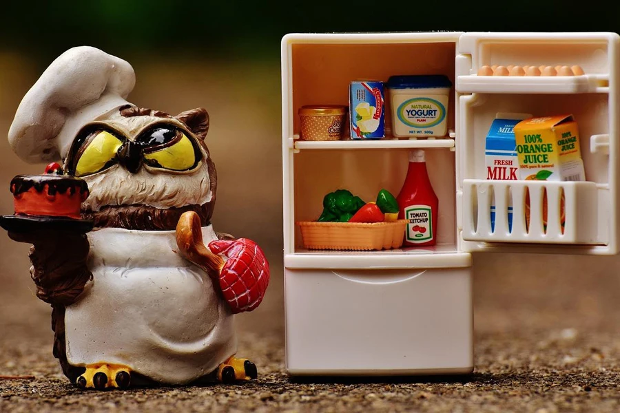 Owl chef figurine with refrigerator