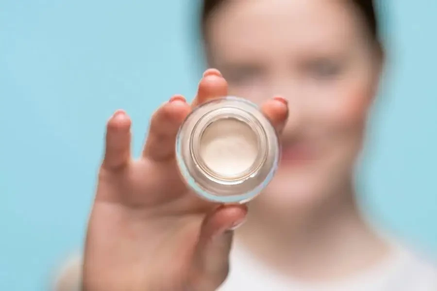 Person Holding A Concealer by Ron Lach