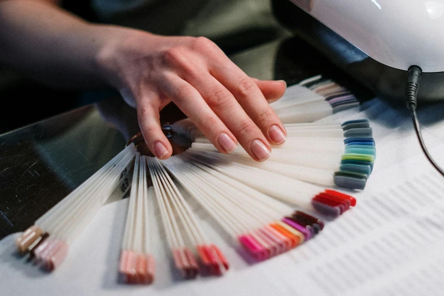 Person Holding White Printer Paper