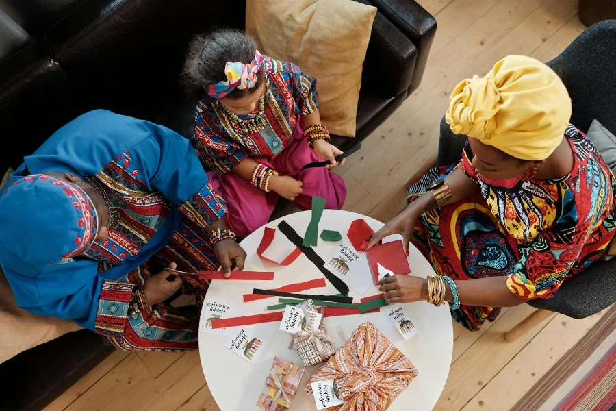 Photo Of Family Wrapping Gifts 