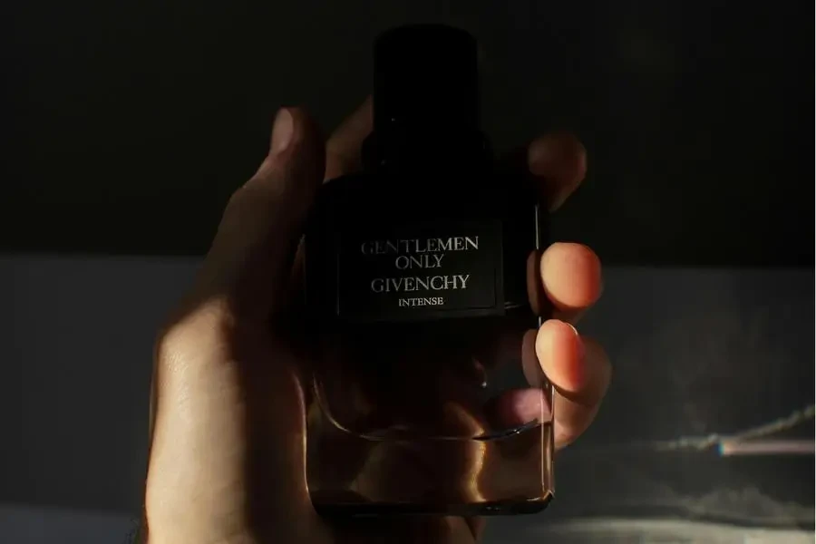 Photo of Person Holding a Gentlemen Only Cologne Bottle