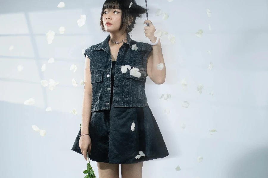 Photo of a Woman Holding a Transparent Ubrella