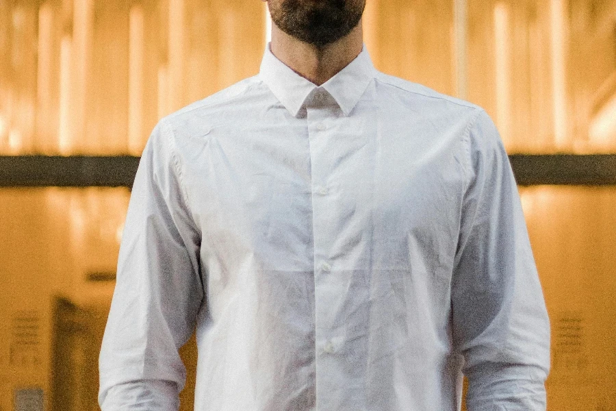 Selective Focus Photo of Man in White Dress Shirt Posing