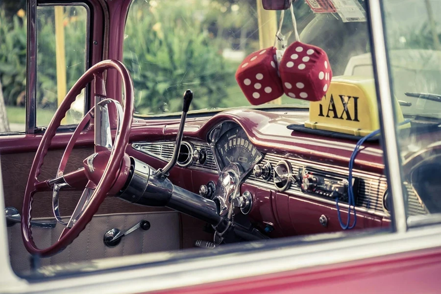 Selective Focus Photography of Red Vehicle Interior