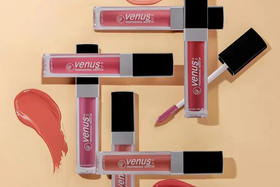 Six Venus Lip Glosses on Beige Panel by 𝐕𝐞𝐧𝐮𝐬 𝐇𝐃 𝐌𝐚𝐤𝐞- 𝐮𝐩 𝐏𝐞𝐫𝐟𝐮𝐦𝐞