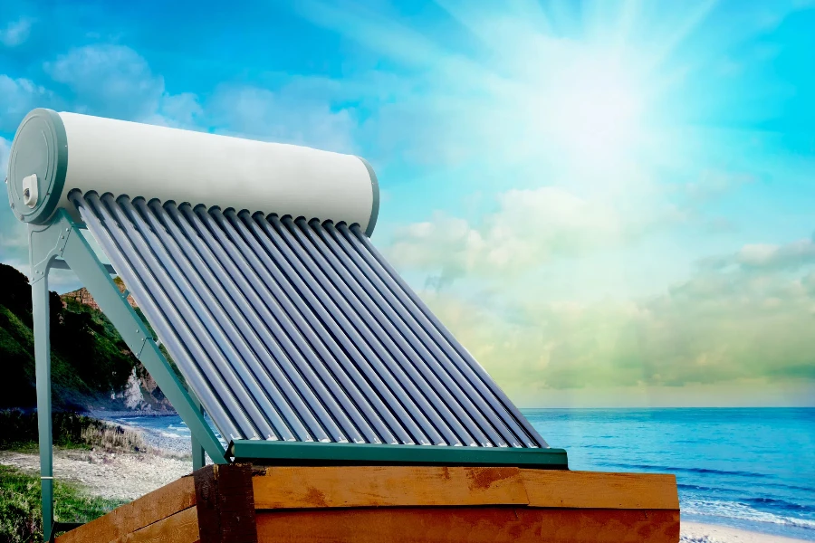 Solar heater for green energy on the background of sun and clouds