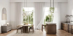 Spacious modern kitchen design featuring sleek wood finishes, pendant lighting, and a large window offering a serene garden view