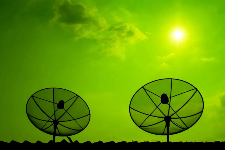 The silhouette of satellite dish and sky background