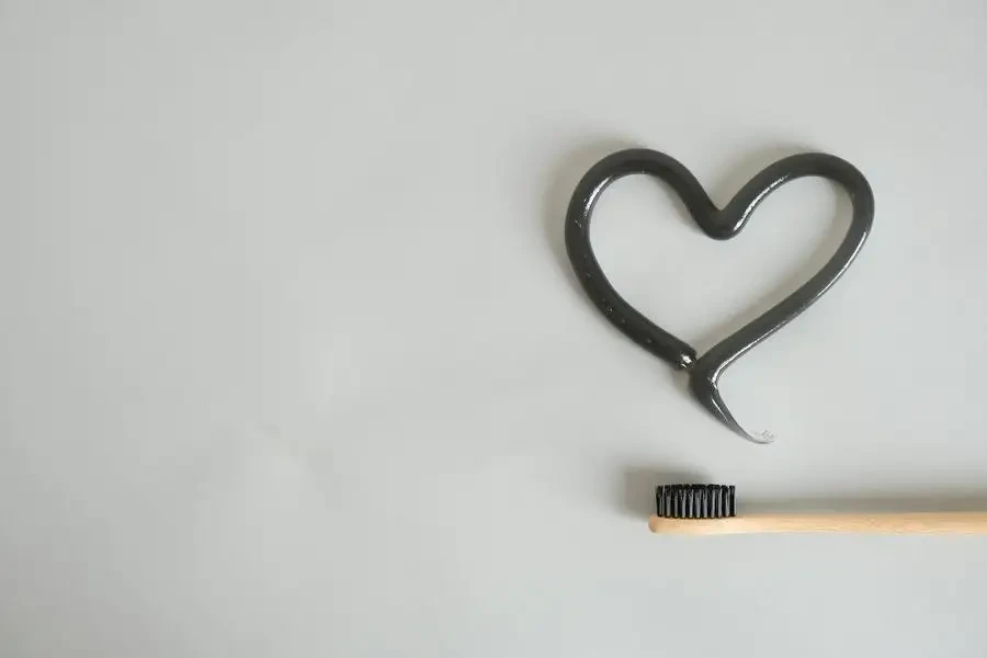 Toothbrush and a Heart Painted with Toothpaste by hello aesthe