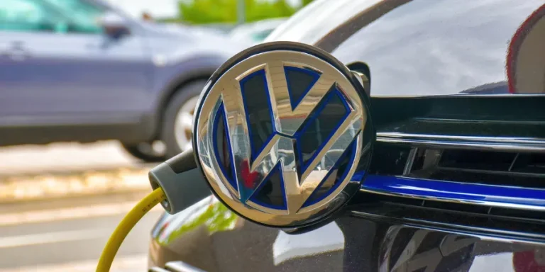 Volkswagen Golf GTE is charged at a charging station