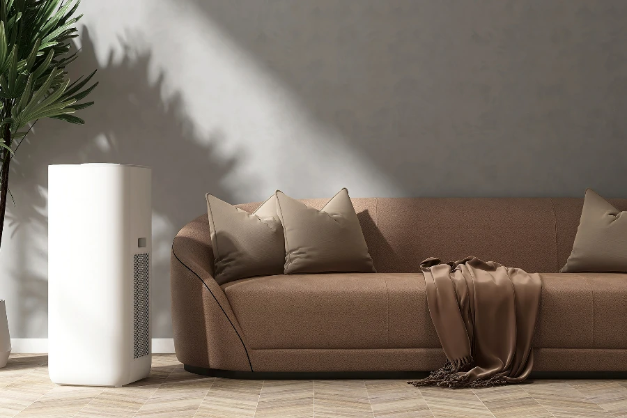 White modern design air purifier, dehumidifier on herringbone tile floor in gray wall living room by sofa