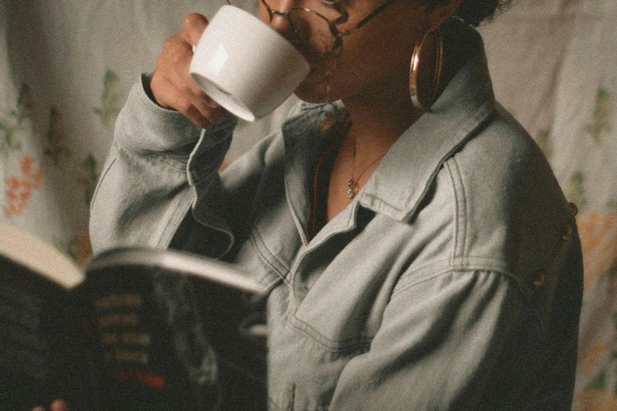 Woman Drinking Coffee in White Ceramic Mug