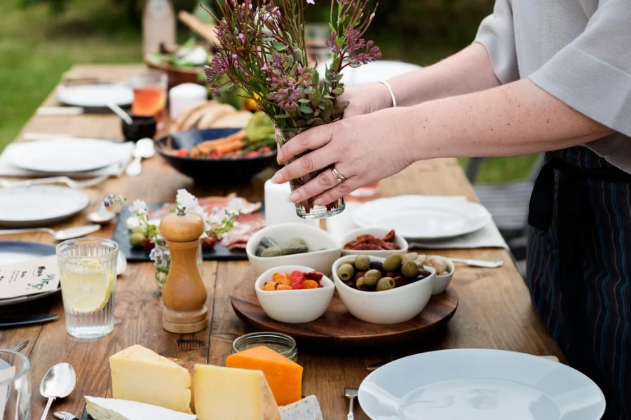 Woman Preparing Table Dinner Concept