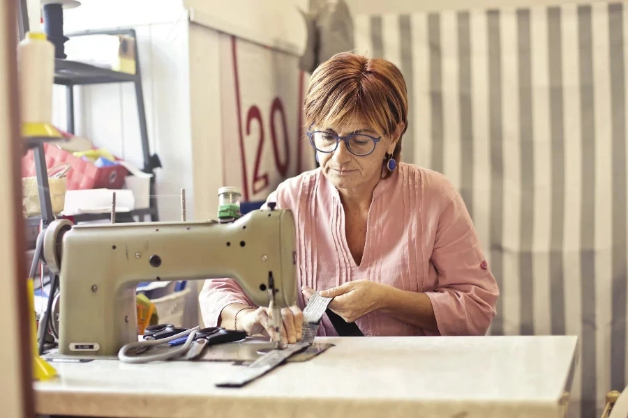 Woman Using Sewing Machine