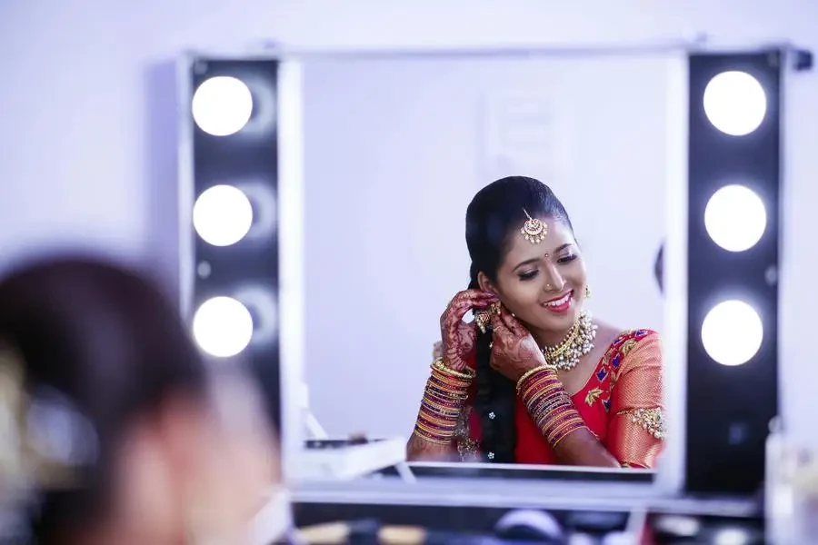 Woman Wearing Red and Beige Dress by sane sravan