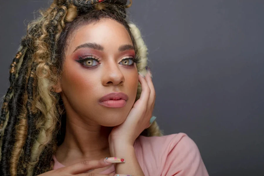 Woman in Pink Shirt with Beautiful Eyes