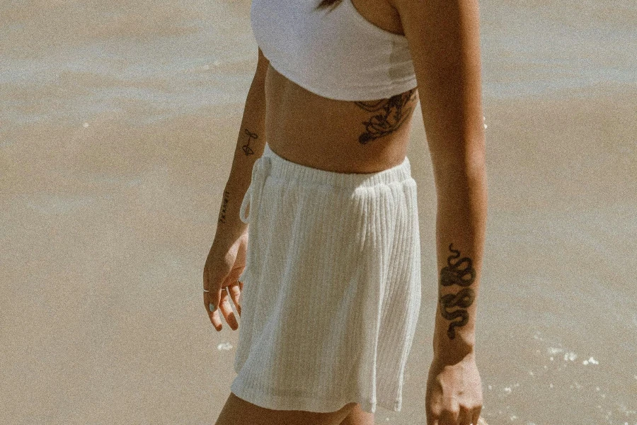 Woman in White and Blue Stripe Skirt