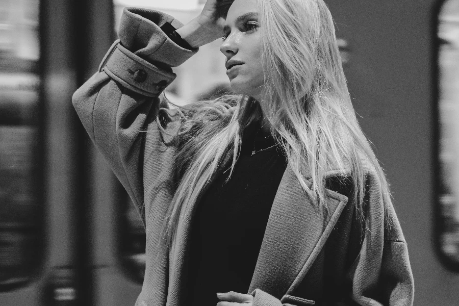 Woman in a Wool Coat on the Train Station