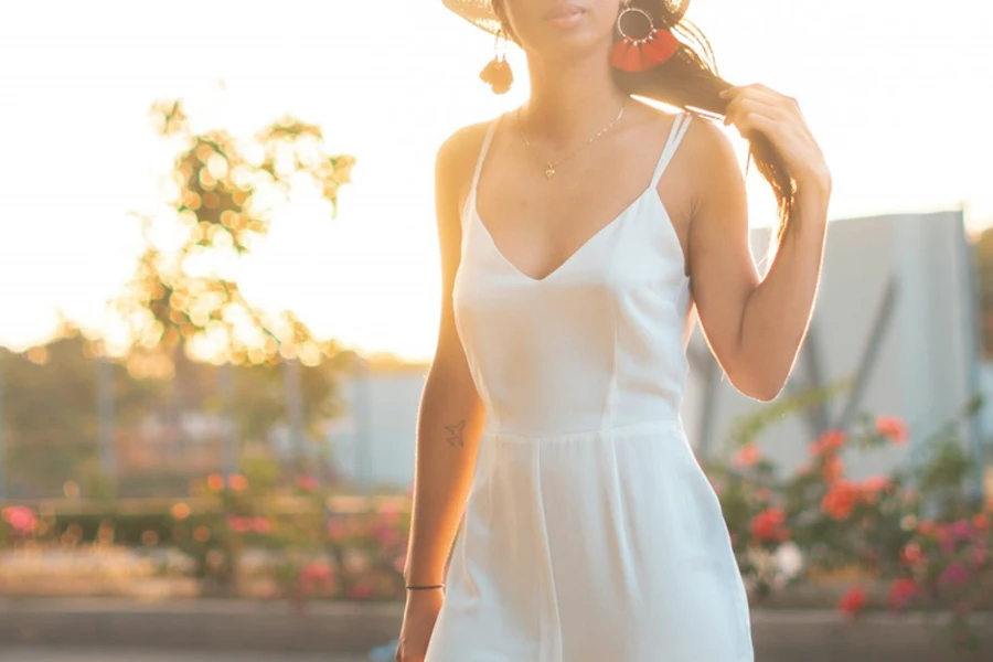 Woman wearing simple white midi summer dress