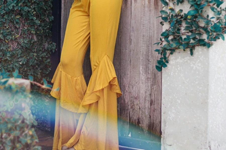 Yellow flare pants with ruffles