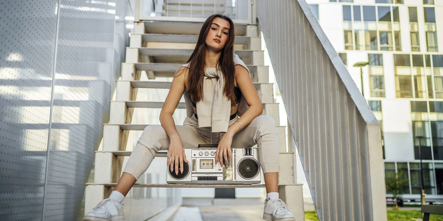 Young woman with a boom box
