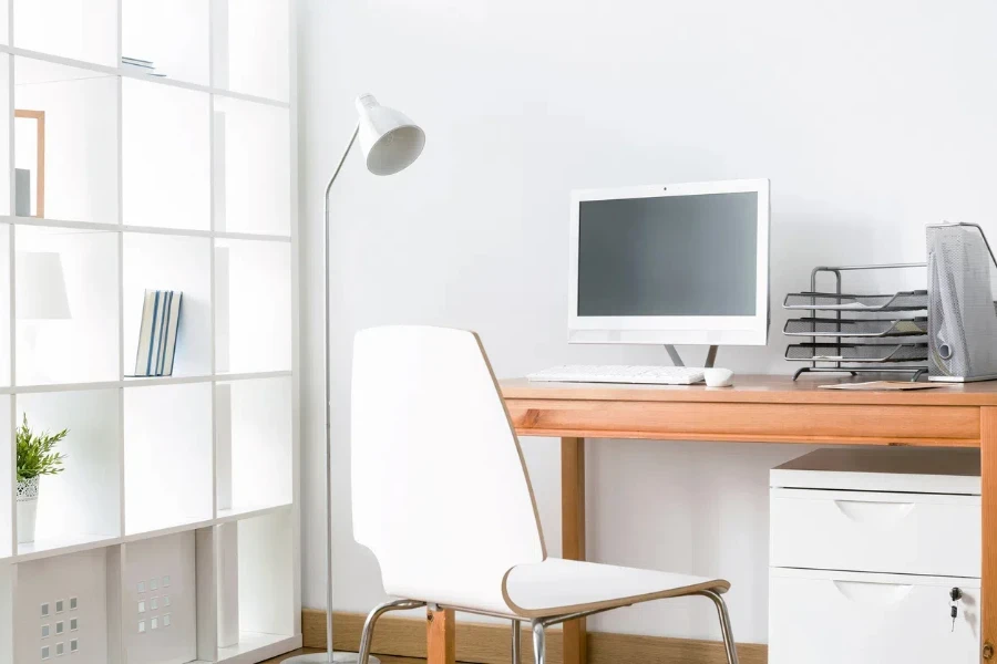 A tiered desk organizer with papers