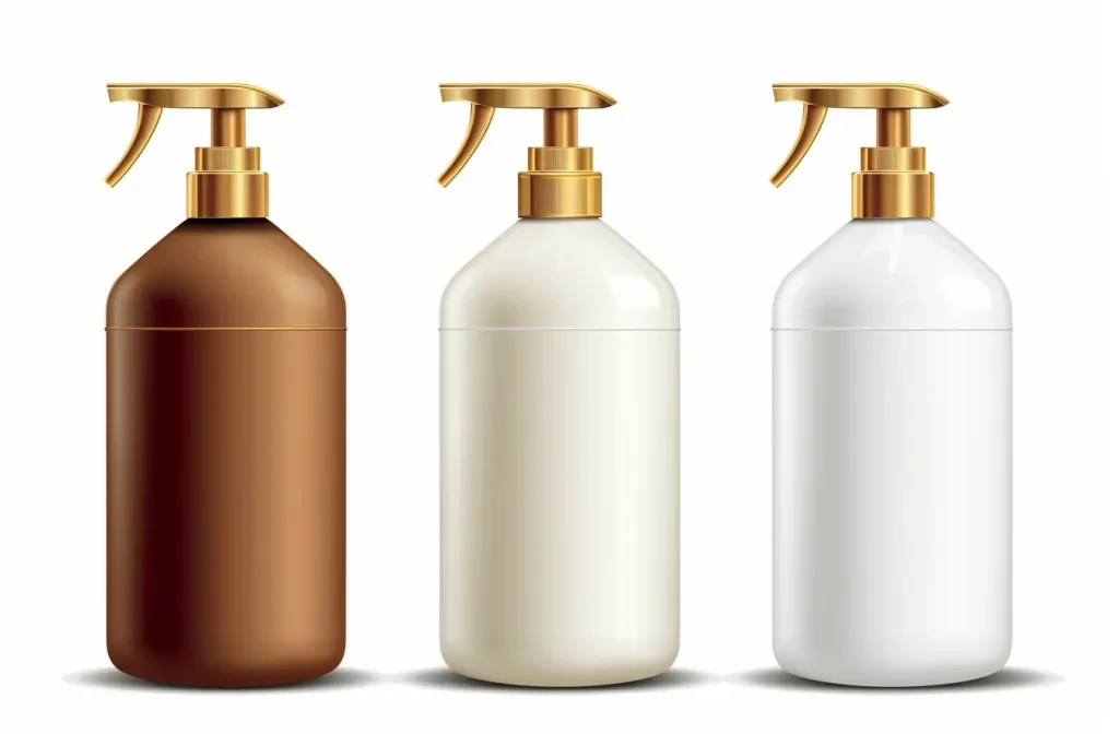 brown and golden shampoo bottles