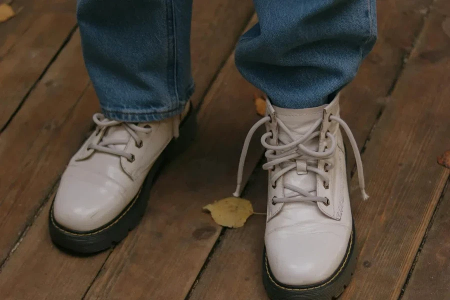 Closeup of denim jeans and Timberland boots