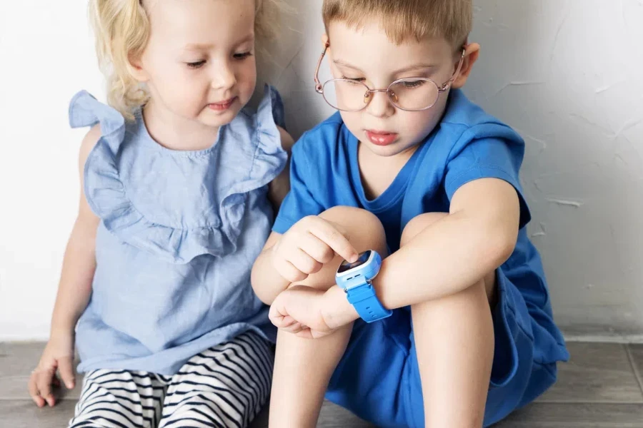 A little boy child in a blue T-shirt and glasses