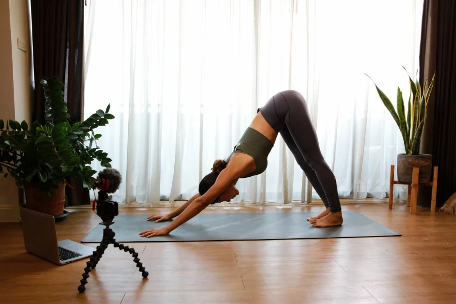 Healthy women doing only show and teach Yoga at home