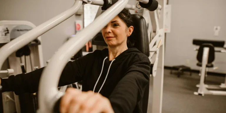 A Woman Working Out in a Gym