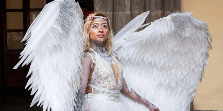 Woman in White Dress with Angel Wings