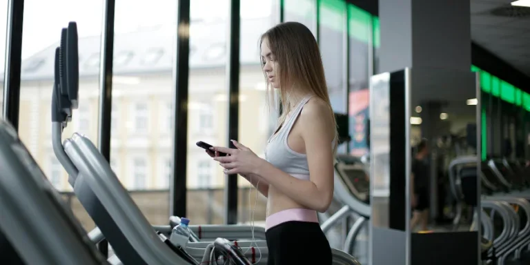 slim young female athlete in sportswear